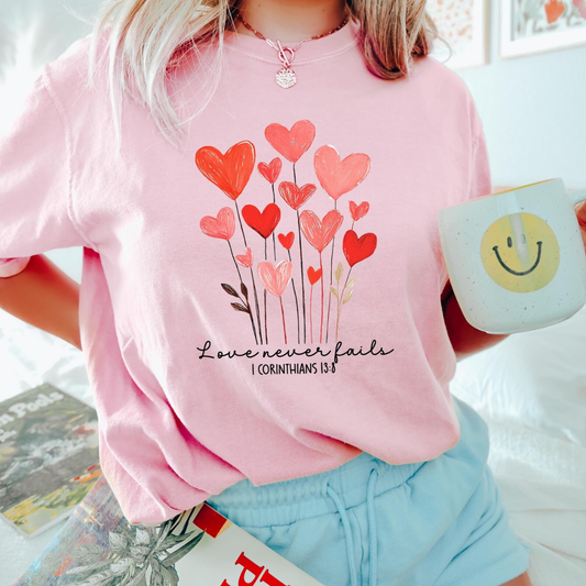 Love Never Fails Valentine's Day Sweatshirt - Light Pink